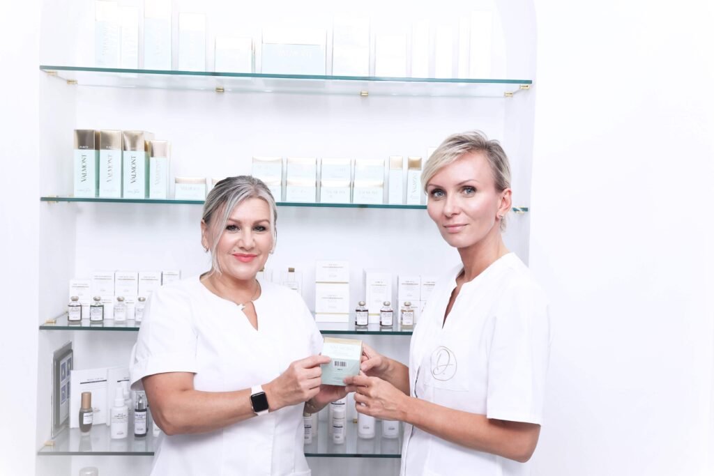 Two Beauty Spa employees are presenting beauty product